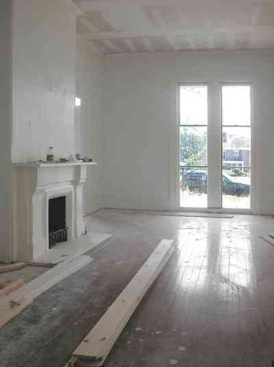 North-Hill:-200-West-Jackson-Street_07.jpg:  heart pine floors, mantle, fireplace, floor length windows, victorian house, front porch