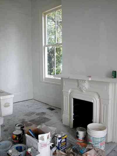 North-Hill:-200-West-Jackson-Street_16.jpg:  mantle, heart pine floors, casement window, victorian house
