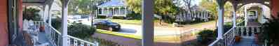 Pensacola:-Seville-Historic-District:-433-East-Zaragoza-Street_06.jpg:  jamie's restaurant, victorian front porch, victorian house, brick sidewalk, historic village, wicker furniture, ferns
